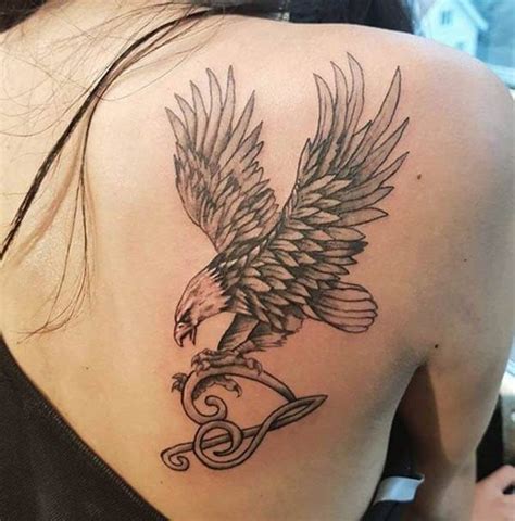 eagle tattoo female|feminine eagle tattoo for women.